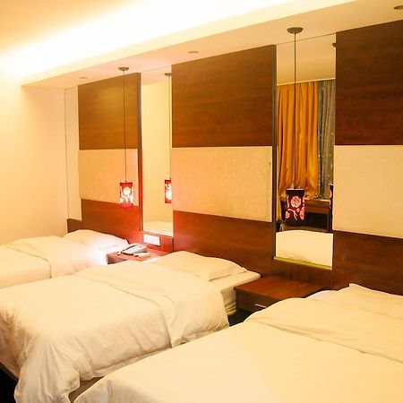 Sentosa Hotel Guangzhou Rum bild