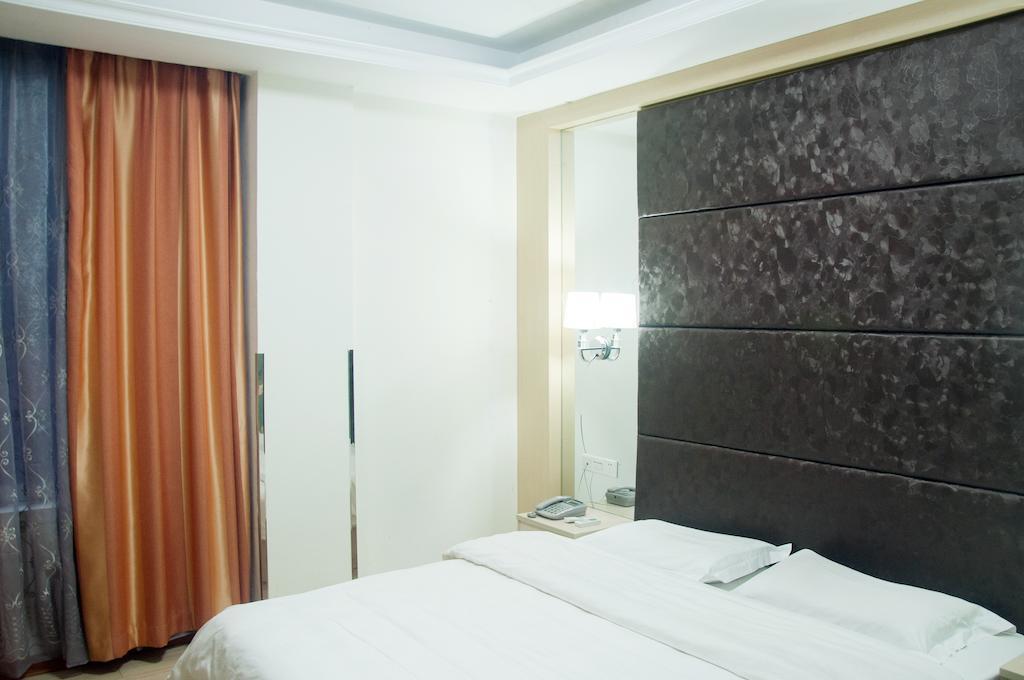 Sentosa Hotel Guangzhou Rum bild