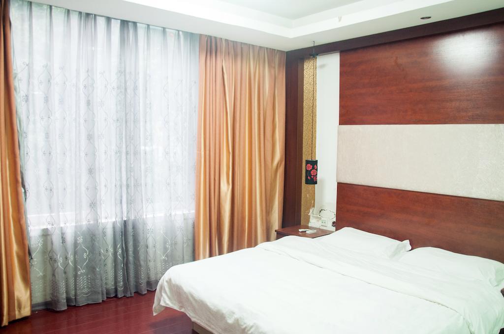 Sentosa Hotel Guangzhou Rum bild