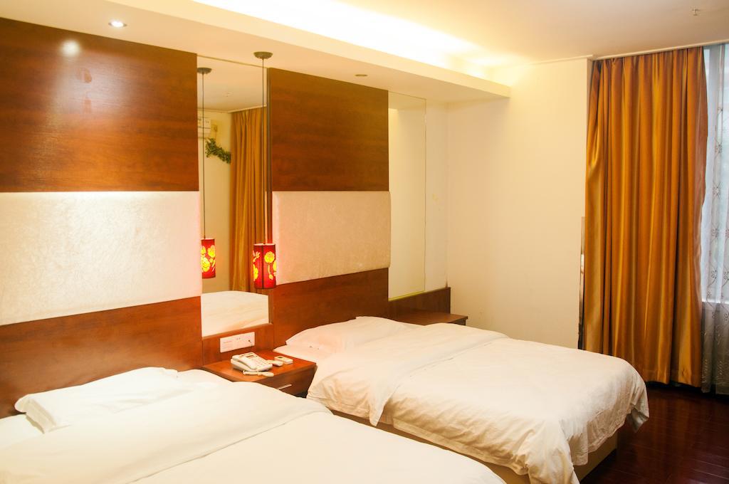 Sentosa Hotel Guangzhou Rum bild