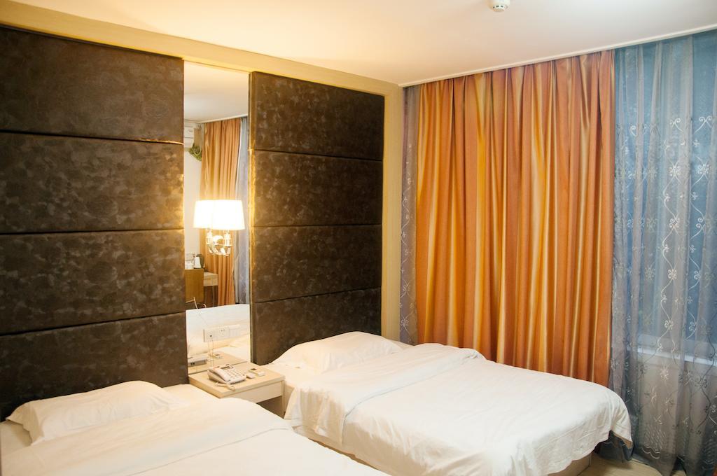 Sentosa Hotel Guangzhou Rum bild
