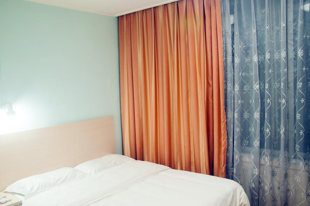 Sentosa Hotel Guangzhou Rum bild