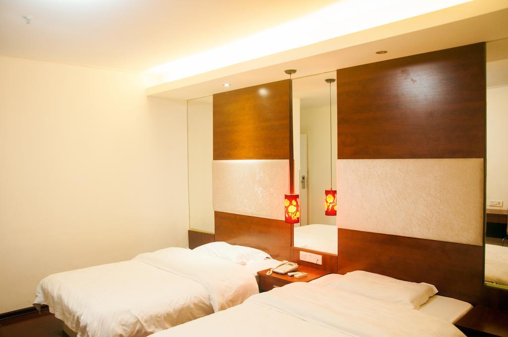 Sentosa Hotel Guangzhou Rum bild