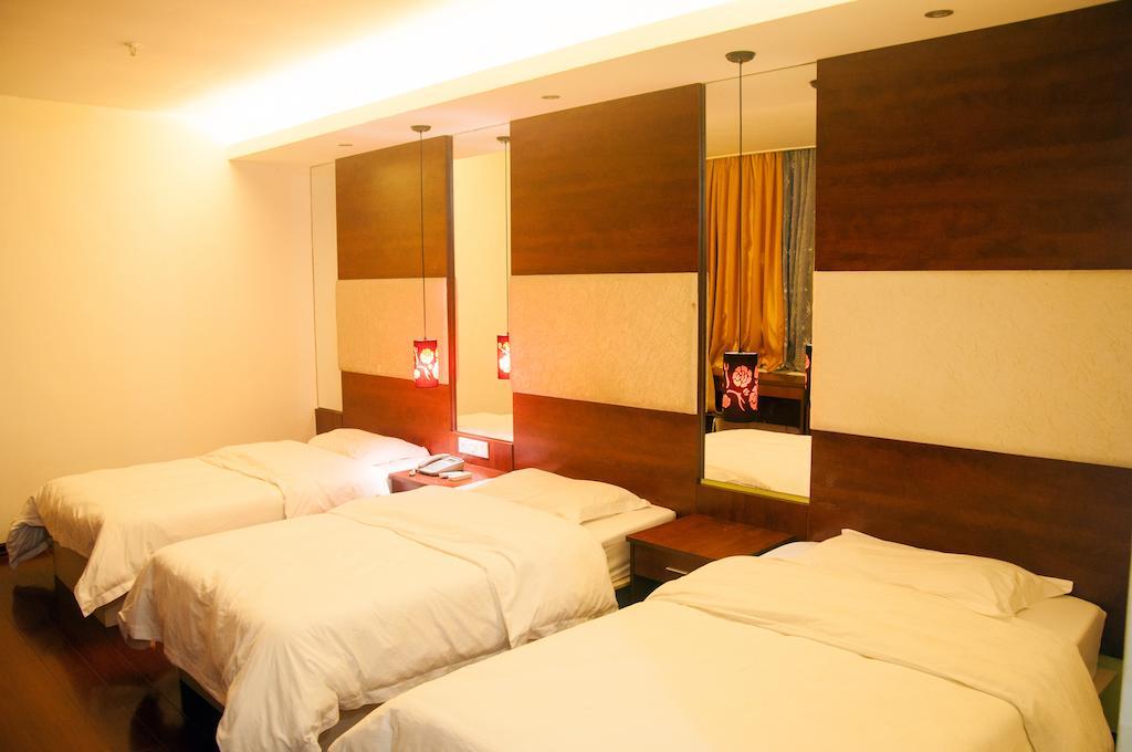 Sentosa Hotel Guangzhou Rum bild